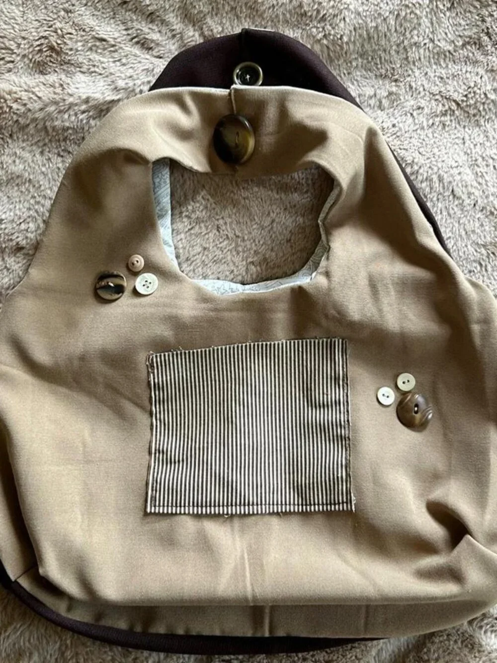 Brown & tan tote bag with beige and brown striped patch and button details